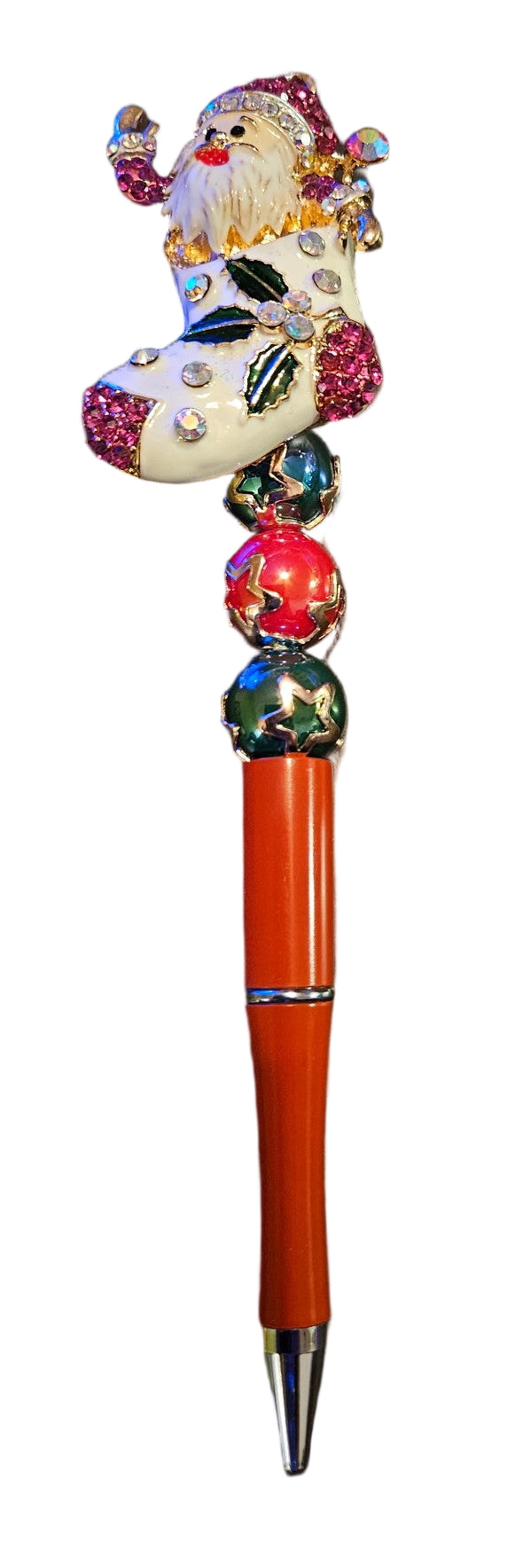 Decorative pen with a Santa Claus design on top and a red body.